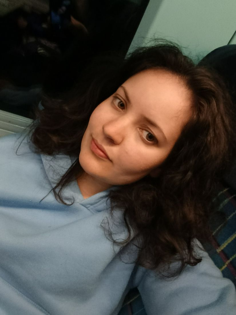 Selfie of Ella on a train seat